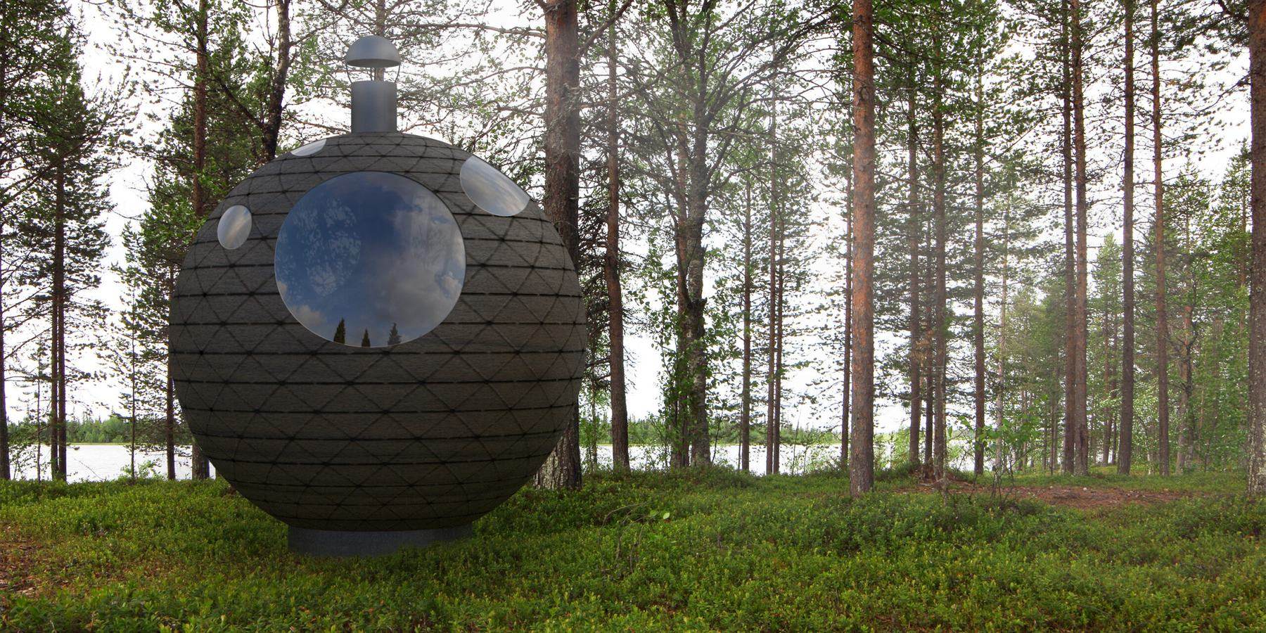 Pallon muotoinen sauna m&auml;ntymets&auml;ss&auml; j&auml;rven rannalla. Tummaa ristikkorakennetta rikkovat py&ouml;re&auml;t ikkunat, joista heijastuu taivas.